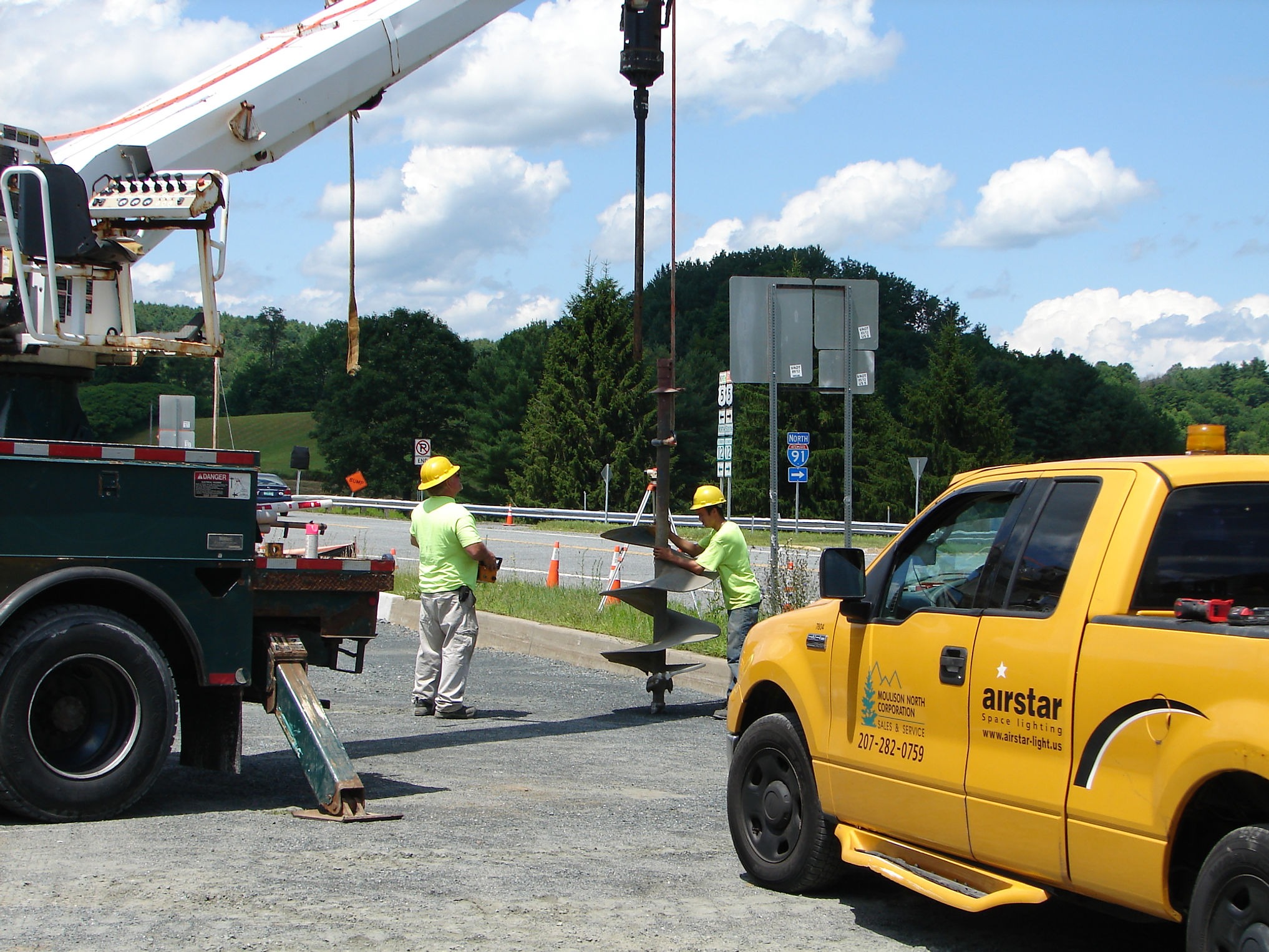 Employees monitoring a drill at the Park N' Ride