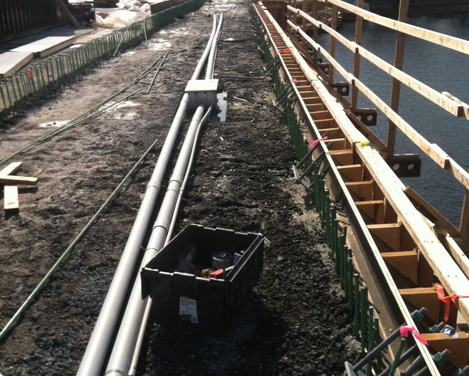 Cables and piping laid at Burns Bridge