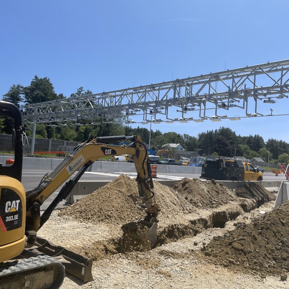 The Moulison team installing a toll booth system